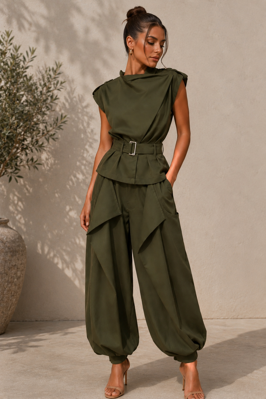 Sleeveless belted top with wide-leg draped pants